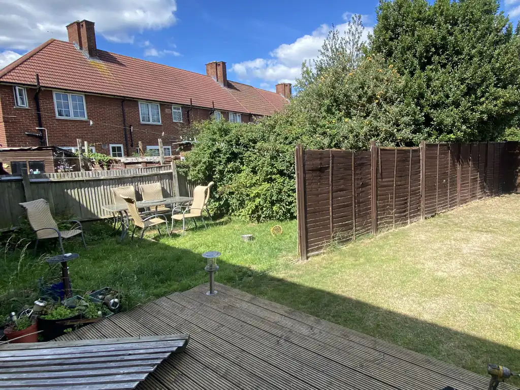 A weathered, sagging lap fence before TBL Fencing Services replaced it